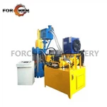 Briket Logam Hidraulik Menegak